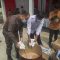 Kepala Seksi Pidana Umum Kejaksaan Negeri Kabupaten Tangerang, Malda (kiri), saat Memusnahkan Barang Bukti Oli Palsu.