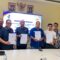 Ketua KONI Kabupaten Tangerang Eka Wibayu dan jajarannya bersama Rektor Universitas Tangerang Raya Mardiyana beserta jajarannya seusai penandatanganan nota kesepahaman dan perjanjian kerja sama, Kamis (13/8).
